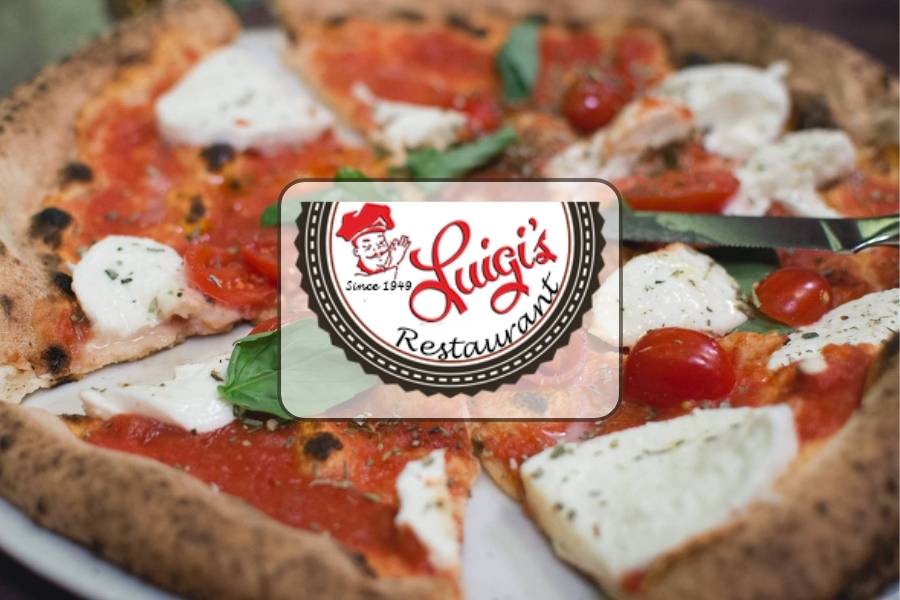 Authentic Italian Margherita pizza with fresh mozzarella and basil at Luigi’s Restaurant in Akron Ohio